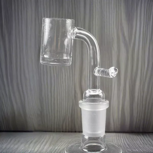 Clear glass dab rig with banger, water chamber, and stable base for smooth concentrate smoking.