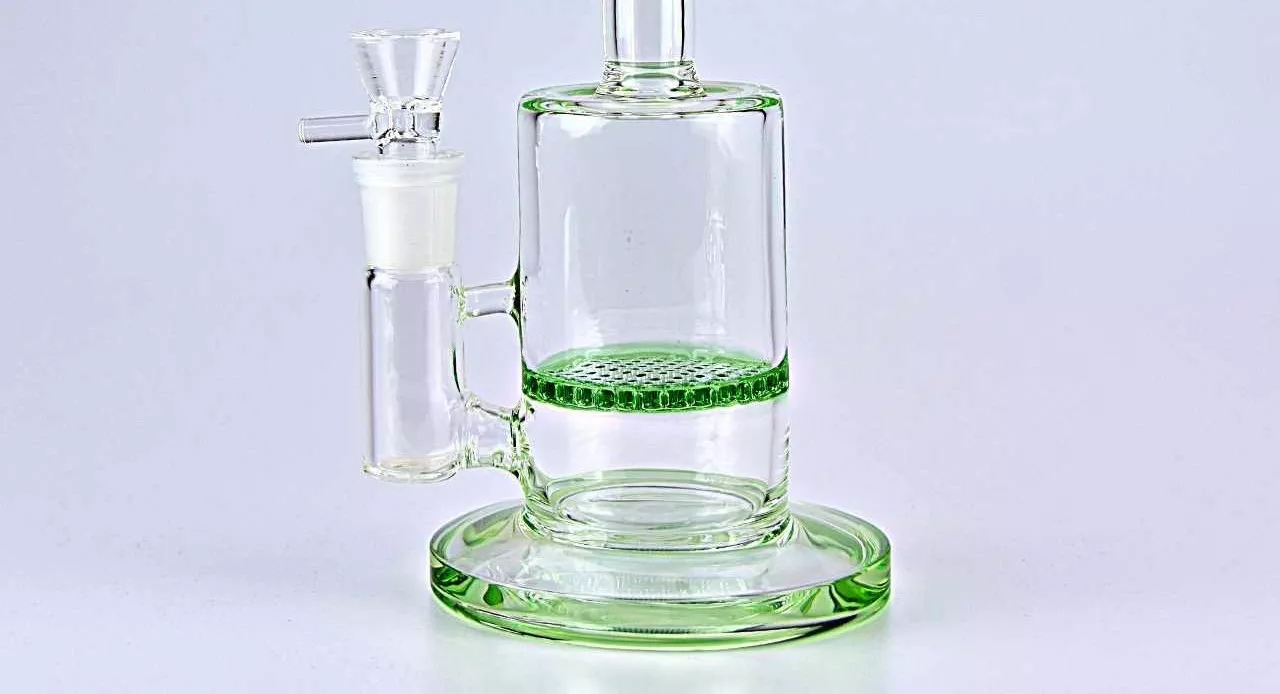 Green accented glass bong with percolator for efficient smoke filtration and cooling.