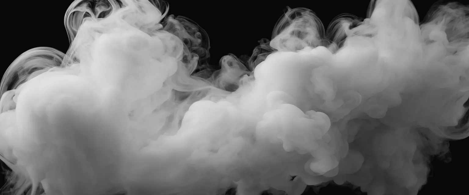 High-resolution black and white photo of intricate smoke patterns against a dark background.