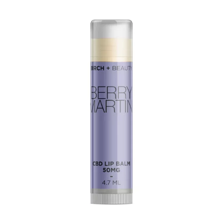 CBD-infused Berry Martini lip balm by Birch + Beauty in a sleek, purple-labeled tube.
