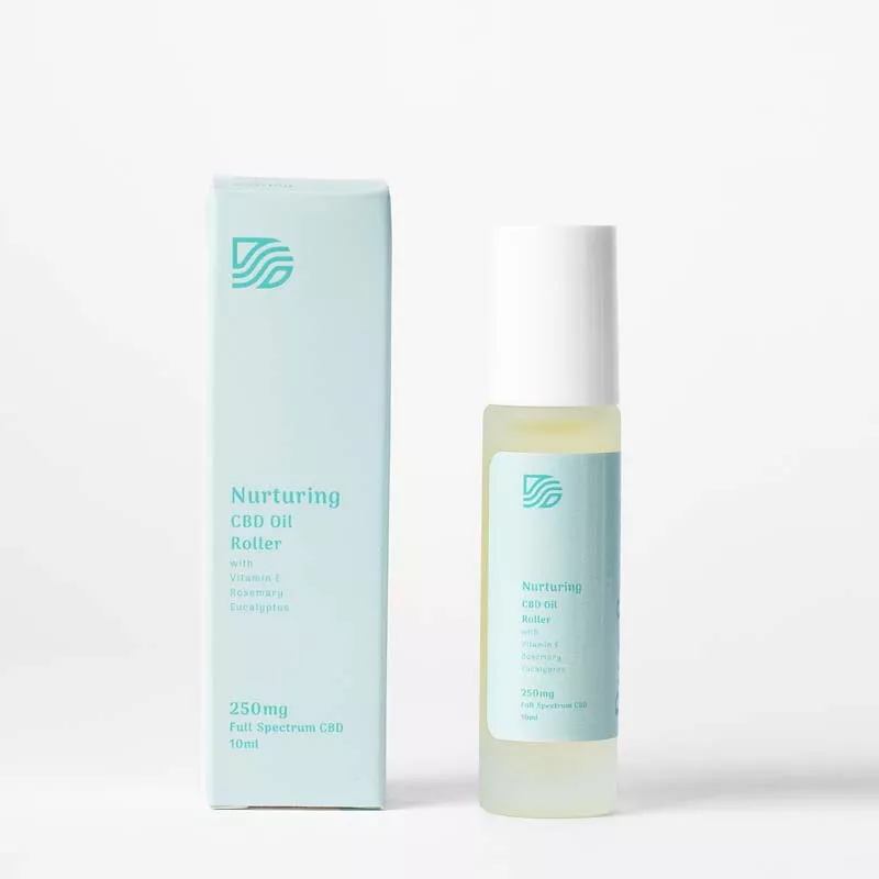 Nurturing CBD oil roller with 250mg full-spectrum CBD and essential oils in minimalist packaging.