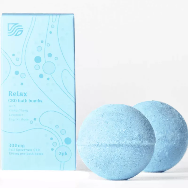Light blue CBD bath bombs 2-pack with Ylang-Ylang, Lavender, and English Rose aromatics.