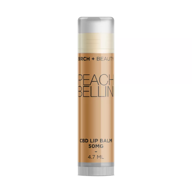 Peach Bellini flavored CBD lip balm by Birch + Beauty, 50mg, 4.7ml container.