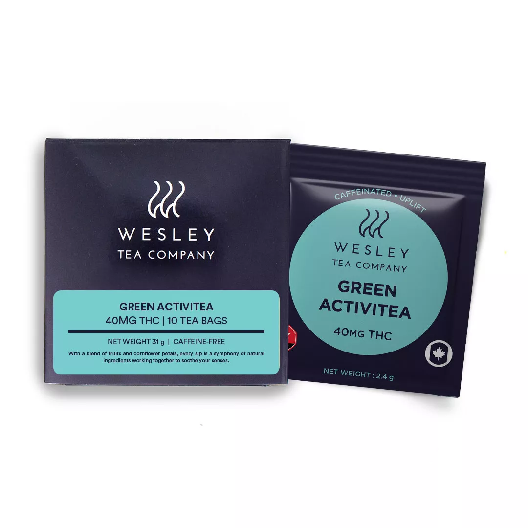 Tea packaging featuring blue and black colors, labeled green activitea, includes tea bags.