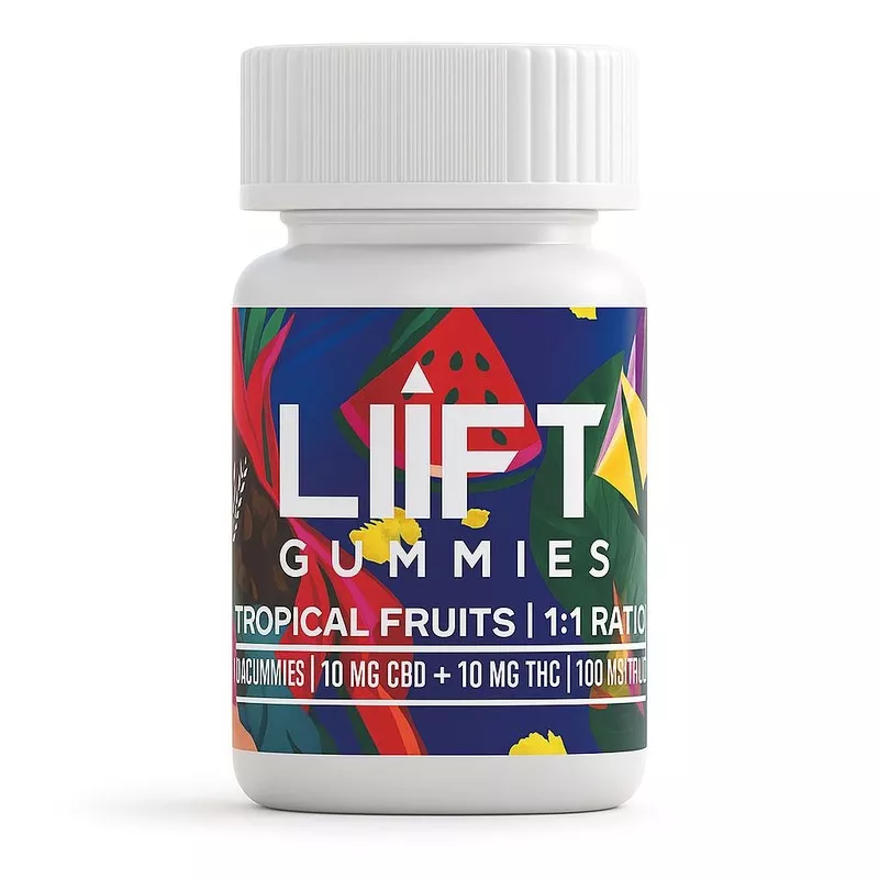Colorful bottle of gummy supplements with tropical fruit design and white cap.